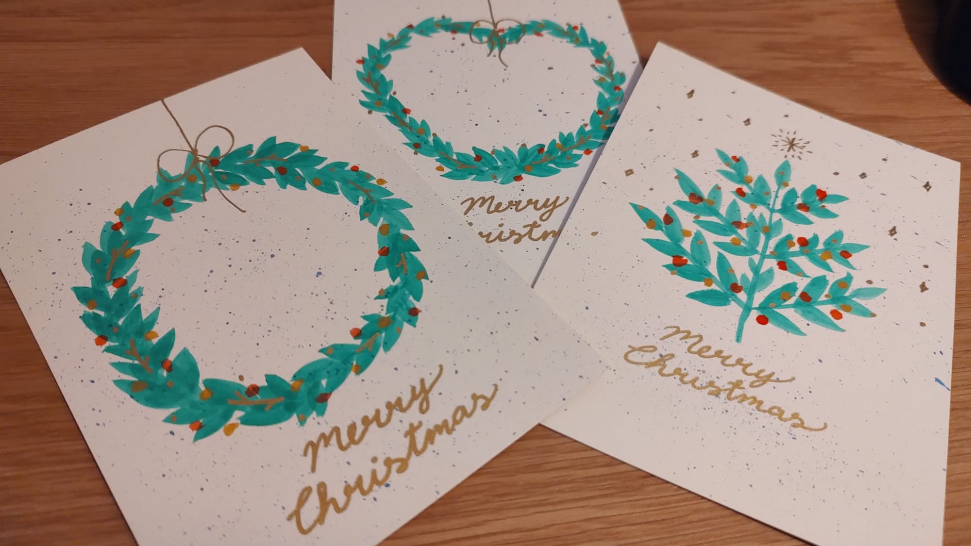 Aquarel kerstkaarten met kransen